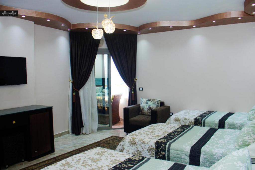 Aswan Plaza - Share Apartment Bagian luar foto