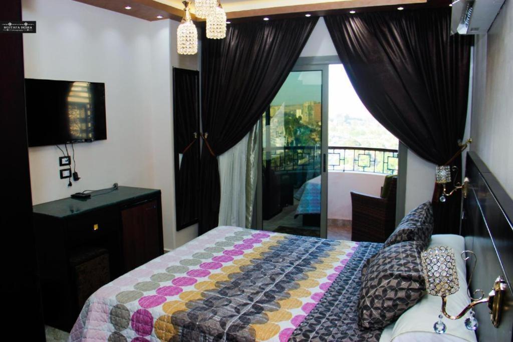 Aswan Plaza - Share Apartment Bagian luar foto